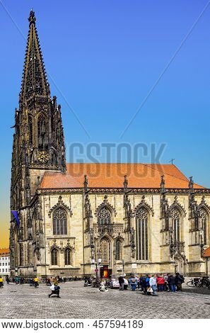 Muenster, Germany - April 29, 2022: Scenic View To Facade Of Old Historic Houses In Panoramic View A
