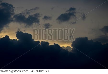 Storm Clouds Of Fluffy Puffy Shape The Beginning Of A Bubble-shaped Thunderstorm, Steel-gray Color T