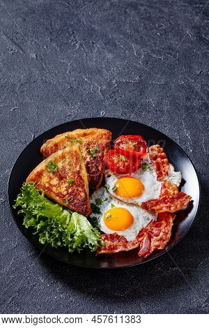 Irish Breakfast Of Fried Eggs, Rasher Or Bacon Slices, Fried Potato Farls, Grilled Tomatoes And Fres