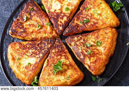 Close-up Of Potato Farls, Irish Potato Cakes, Potato Bread Sprinkled With Parsley On Black Plate On 