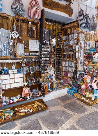 Lindos, Greece - 27 September, 2021. The Souvenirs Shops In Old Path Of Lindos Town, Greece