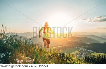 Active Mountain Trail Runner Dressed Bright T-shirt With Backpack In Sport Sunglasses Running Endura