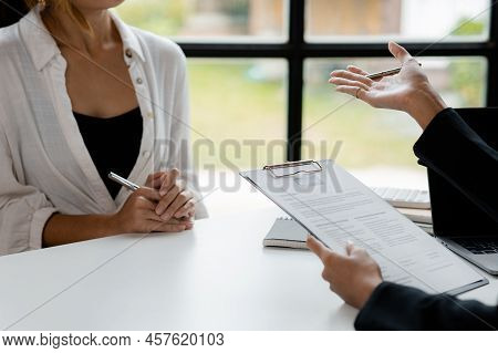 Person Submitting Resume To Interview For A Job With A Company, Person Attending A Job Interview Wit