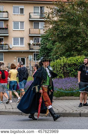 A Man In A Folk Costume Of A Steward, At The Festival