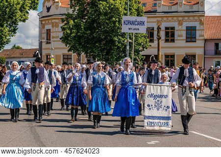 People In Slovak Folk Costumes In A Procession