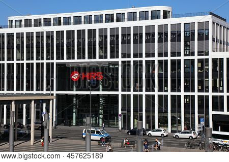Cologne, Germany - September 21, 2020: People Walk By Hrs Group Headquarters In Cologne City, German