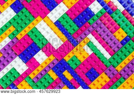 Abstract Background Texture Of Colored Constructor Blocks. Background Of Colorful Plastic Part Of Co