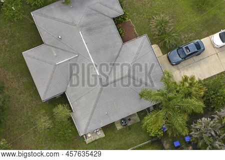 Aerial View Of Typical Contemporary American Private House With Roof Top Covered With Asphalt Shingl