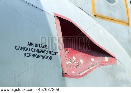 Air Intake Cargo Compartment Refrigerator Decal On An Old Aircraft.