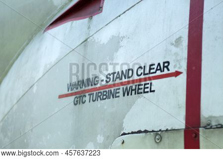 Warning Stand Clear Turbine Wheel Decal On An Old Aircraft.