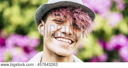 Happy Cheerful Handsome Trendy Alternative Young Man Teenager Portrait Smiling On Camera With Colour