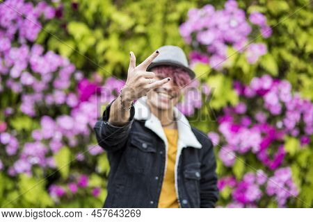 Happy Cheerful Handsome Trendy Alternative Young Man Teenager Portrait Smiling On Camera With Colour