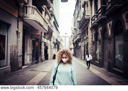 Sad Woman Stand In The. Middle Of The Road In The City Wearing Protection Coronavirus Mask - Concept