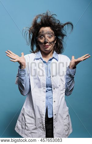 Insane And Silly Looking Crazy Scientist With Messy Hairstyle And Dirty Face Does Not Understand Whe