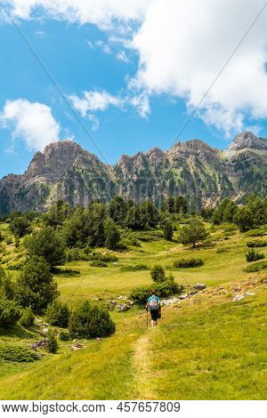 A Hiker On The Trek To The Piedrafita Arch In The Pyrenees In Panticosa, Aragon