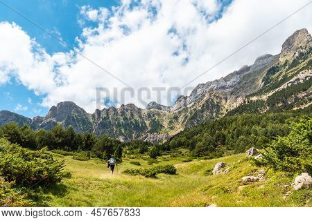 A Young Woman Climbing The Mountain To The Piedrafita Arch, Alto Gallego, Huesca, Aragon