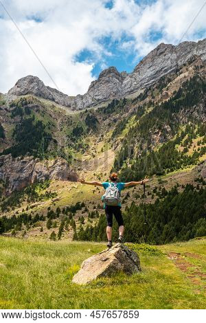 A Young Woman Climbing The Mountain To The Piedrafita Arch, Alto Gallego, Huesca, Aragon