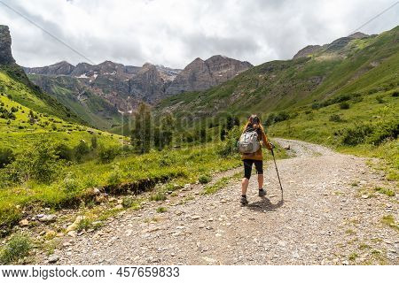 A Hiker On The Trek In The Ripera Valley In The Town Of Panticosa In The Pyrenees