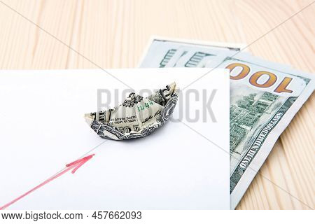 A Draw Of A Chart Of Rising Stock Prices On The Table Made By Red Pen Situated On The White The Shee