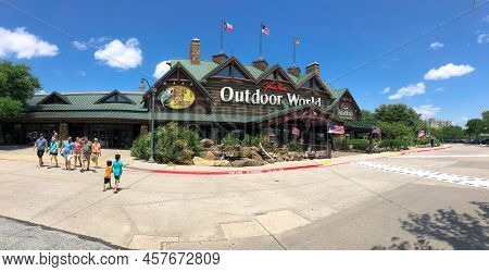 Panorama View Exterior Storefront Bass Pro Shop, Outdoor World Chain With Customers In Busy Summer