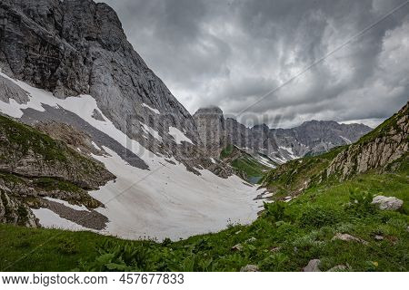 Mountain Hiking Trail Road. Grey Sky Before Thunderstorm. Between Italy And Austria: Near Volaia Lak
