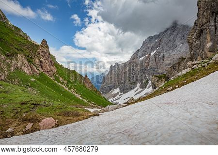 Mountain Hiking Trail Road. Grey Sky Before Thunderstorm. Between Italy And Austria: Near Volaia Lak