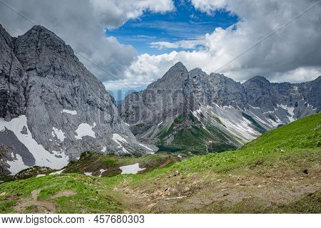 Mountain Hiking Trail Road. Grey Sky Before Thunderstorm. Between Italy And Austria: Near Volaia Lak