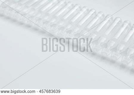 Single Dose Ampoules Of Sterile Isotonic Sea Water Solution On White Background. Space For Text