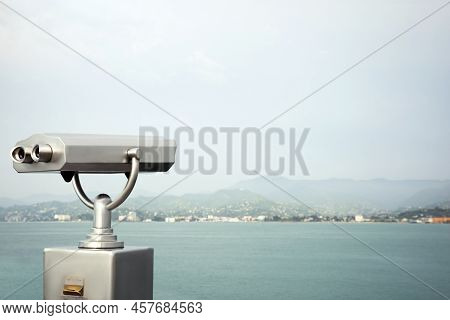 Metal Tower Viewer Installed Near Sea, Space For Text. Mounted Binoculars