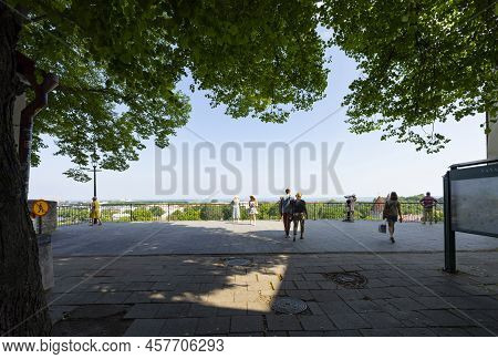 Tallinn, Estonia. July 2022.  Tourists Enjoying The View Of The City From The Patkuli Rooftop Terrac