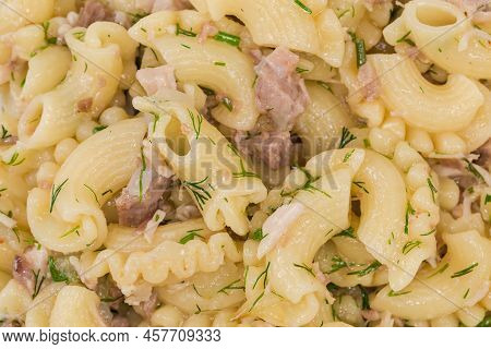 Boiled Short Curved Ruffled Pasta, So-called Creste Di Galli Or Rooster Comb, Mixed With Stewed Minc