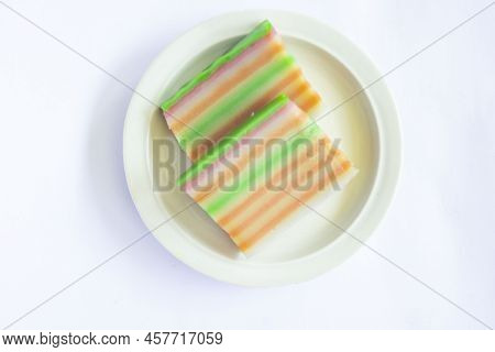 Lapis Cake Or Roti Lapis Or Layer Cake Or Lapis Legit Served In Little Plate Isolated On White Backg