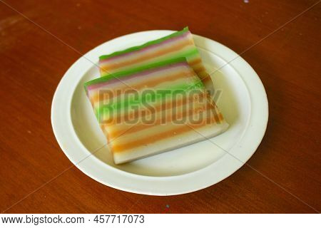 Lapis Cake Or Roti Lapis Or Layer Cake Or Lapis Legit Served In Little Plate Isolated On White Backg