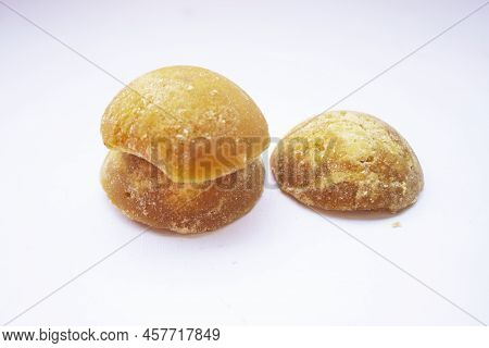Brown Sugar Or Java Sugar Or Palm Sugar Or Gula Jawa Isolated On White Background. Top View. Flat La