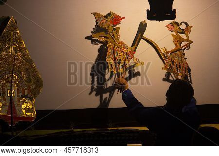 Wayang Kulit Or Shadow Puppets From Java, Indonesia Puppet Show By Dalang Or Puppeteer . Wayang Made