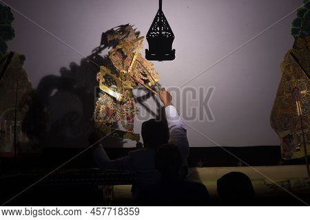 Wayang Kulit Or Shadow Puppets From Java, Indonesia Puppet Show By Dalang Or Puppeteer . Wayang Made