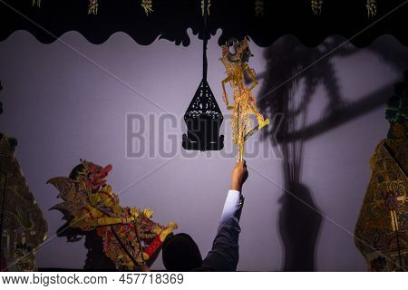 Wayang Kulit Or Shadow Puppets From Java, Indonesia Puppet Show By Dalang Or Puppeteer . Wayang Made