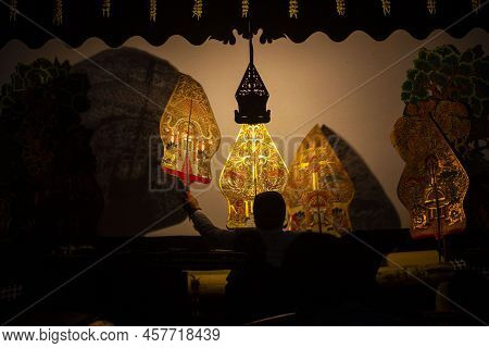 Wayang Kulit Or Shadow Puppets From Java, Indonesia Puppet Show By Dalang Or Puppeteer . Wayang Made