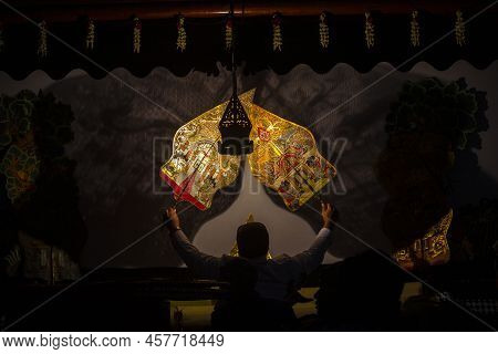 Wayang Kulit Or Shadow Puppets From Java, Indonesia Puppet Show By Dalang Or Puppeteer . Wayang Made