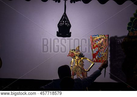 Wayang Kulit Or Shadow Puppets From Java, Indonesia Puppet Show By Dalang Or Puppeteer . Wayang Made