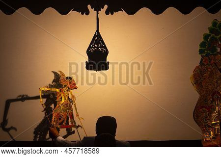 Wayang Kulit Or Shadow Puppets From Java, Indonesia Puppet Show By Dalang Or Puppeteer . Wayang Made