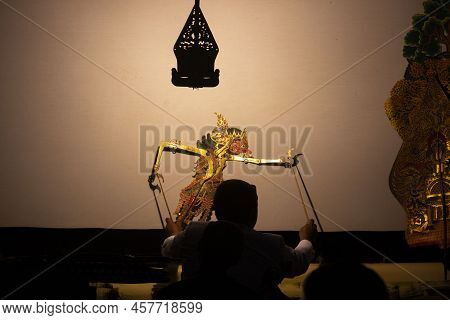 Wayang Kulit Or Shadow Puppets From Java, Indonesia Puppet Show By Dalang Or Puppeteer . Wayang Made