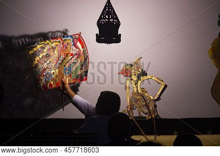 Wayang Kulit Or Shadow Puppets From Java, Indonesia Puppet Show By Dalang Or Puppeteer . Wayang Made