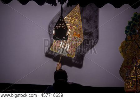 Wayang Kulit Or Shadow Puppets From Java, Indonesia Puppet Show By Dalang Or Puppeteer . Wayang Made