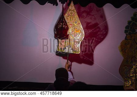 Wayang Kulit Or Shadow Puppets From Java, Indonesia Puppet Show By Dalang Or Puppeteer . Wayang Made