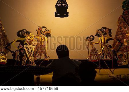 Wayang Kulit Or Shadow Puppets From Java, Indonesia Puppet Show By Dalang Or Puppeteer . Wayang Made