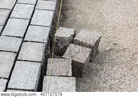 Construcion Site Of Pavement Granite Cobblestone Road In Old City Center Installation Or Renovation 