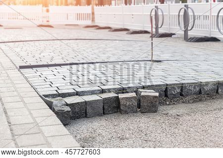 Construcion Site Of Pavement Granite Cobblestone Road In Old City Center Installation Or Renovation 