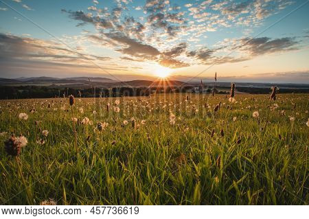 Sunset In The Village Of Raskovice In The East Of The Czech Republic. The Sun Is Illuminating The Bl