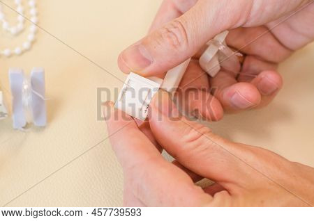 Assembly Of Roller Blinds. Male Hands Are Assembling Roller Blinds, Close-up.